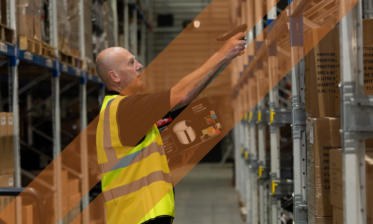 Warehouse operative scanning parcels